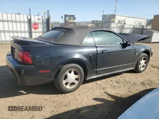2000 Ford Mustang z VIN 1FAFP4442YF105843, wystawiony jako Copart lot #51977385 z przebiegiem 176 981 mil mil oraz Szkoda całkowita • Salvage title. Historia ofert i sprzedaży dostępna na DreamBid. Obrazek 3.