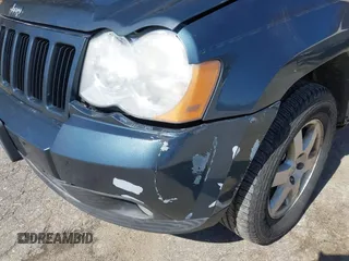 2008 Jeep Grand Cherokee Laredo with VIN 1J8GR48K98C161239, listed as a IAAI auction lot 42090850 with 218,063 mi miles. Bid and sale history available at carsss.com. Image 6.