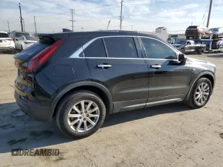 2019 Cadillac XT4 FWD Luxury z VIN 1GYAZAR42KF116087, wystawiony jako Copart lot #50231165 z przebiegiem 69 091 mil mil oraz Szkoda całkowita • Salvage title. Historia ofert i sprzedaży dostępna na DreamBid. Obrazek 3.