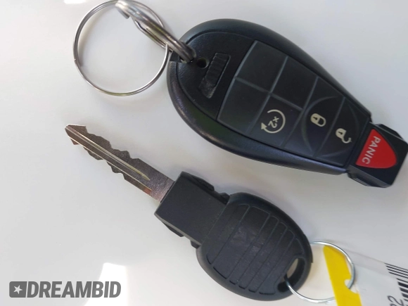 2015 Jeep Cherokee Trailhawk with VIN 1C4PJMBS3FW704622, listed as a IAAI auction lot 42465702 with 96,831 mi miles and . Bid and sale history available at DreamBid. Image 11.