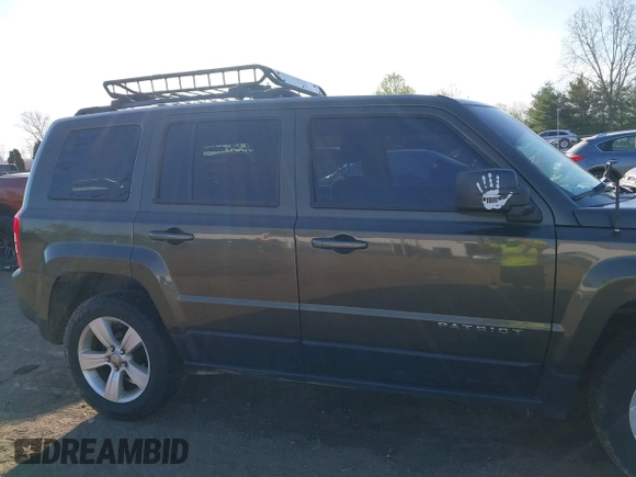 2016 Jeep Patriot High Altitude Edition with VIN 1C4NJRFB4GD581179, listed as a IAAI auction lot 42101912 with 168,254 mi miles. Bid and sale history available at carsss.com. Image 13.