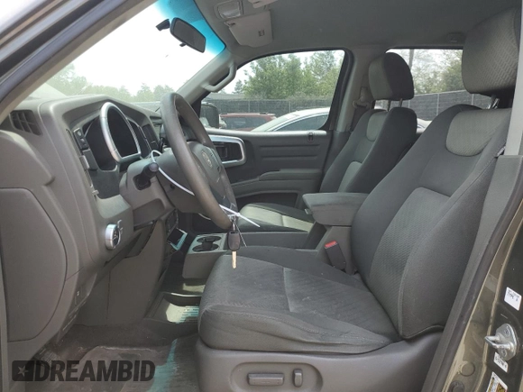 2006 Honda Ridgeline RTS z VIN 2HJYK16476H544699, wystawiony jako Copart lot #53528725 z przebiegiem 225 881 mil mil oraz Szkoda całkowita • Salvage title. Historia ofert i sprzedaży dostępna na DreamBid. Obrazek 7.