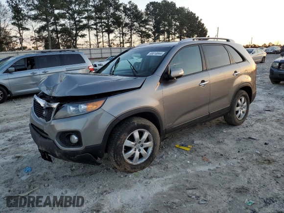 2012 Kia Sorento LX with VIN 5XYKTCA69CG256544, listed as a Copart auction lot 85510044 with 167,395 mi miles and Salvage Title. Bid and sale history available at DreamBid. Image 1.