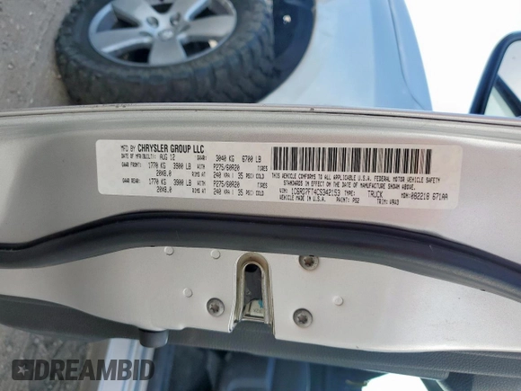 2012 Ram 1500 Express with VIN 1C6RD7FT4CS342153, listed as a Copart auction lot 62348175 with 151,528 mi miles and Salvage title. Bid and sale history available at DreamBid. Image 12.