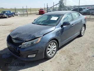 2015 Kia Optima LX z VIN 5XXGM4A7XFG451577, wystawiony jako IAAI lot #41771277 z przebiegiem 60 103 mil mil oraz . Historia ofert i sprzedaży dostępna na DreamBid. Obrazek 2.