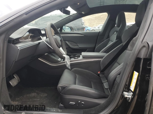 2024 Tesla Model S Plaid z VIN 5YJSA1E65RF543822, wystawiony jako Copart lot #48545205 z przebiegiem 2 473 mil mil oraz Szkoda całkowita • Salvage title. Historia ofert i sprzedaży dostępna na DreamBid. Obrazek 7.