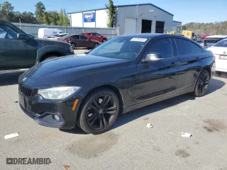 2015 BMW 4 Series 428i xDrive with VIN WBA4C9C51FD331771, listed as a Copart auction lot 82763504 with 124,945 mi miles and Salvage Title. Bid and sale history available at carsss.com. Image 1.