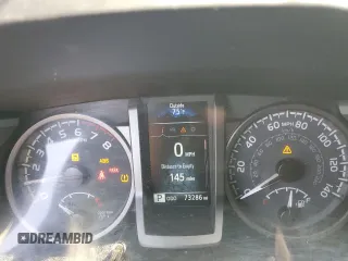 2023 Toyota Tacoma SR with VIN 3TMCZ5AN8PM545588, listed as a Copart auction lot 57528655 with 73,286 mi miles and Salvage title. Bid and sale history available at DreamBid. Image 9.