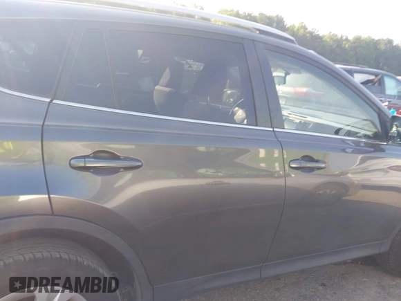 2014 Toyota RAV4 LE z VIN JTMZFREV9E5018084, wystawiony jako IAAI lot #42573040 z przebiegiem 168 661 mil mil oraz . Historia ofert i sprzedaży dostępna na DreamBid. Obrazek 13.