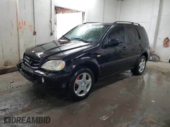2000 Mercedes-Benz M-Class AMG with VIN 4JGAB74EXYA219143, listed as a Copart auction lot 71922634 with 156,092 mi miles and Salvage Title. Bid and sale history available at carsss.com. Image 1.