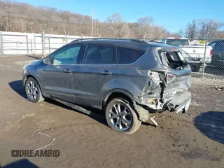 2014 Ford Escape SE z VIN 1FMCU9GXXEUB99093, wystawiony jako IAAI lot #41662040 z przebiegiem 120 783 mil mil oraz . Historia ofert i sprzedaży dostępna na DreamBid. Obrazek 3.