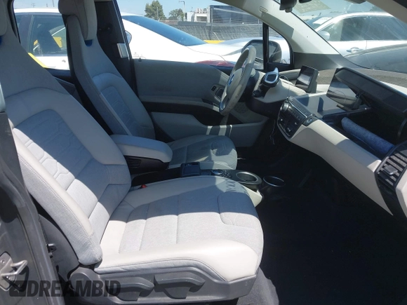 2014 BMW i3 with VIN WBY1Z2C55EV284358, listed as a IAAI auction lot 42597996 with 48,233 mi miles and . Bid and sale history available at DreamBid. Image 5.