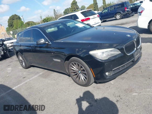2012 BMW 7 Series 740i with VIN WBAKA4C5XCDS99253, listed as a IAAI auction lot 41710171 with 176,907 mi miles. Bid and sale history available at carsss.com. Image 1.