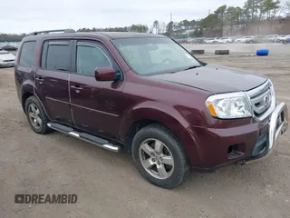 2009 Honda Pilot EX-L with VIN 5FNYF48569B018445, listed as a IAAI auction lot 41808595 with 999,999 mi miles. Bid and sale history available at carsss.com. Image 1.