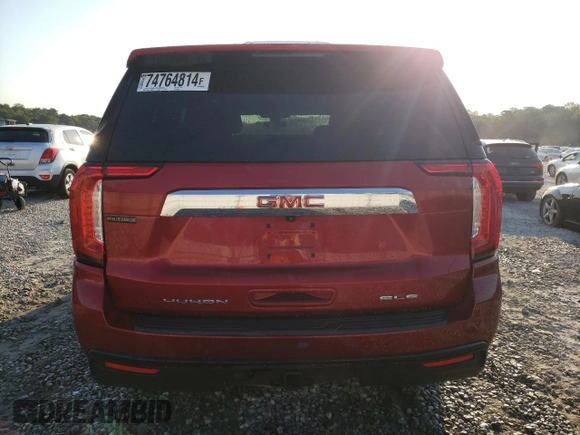 2021 GMC Yukon SLE with VIN 1GKS1AKD6MR200592, listed as a Copart auction lot 74764814 with 61,904 mi miles and Salvage Title. Bid and sale history available at carsss.com. Image 6.