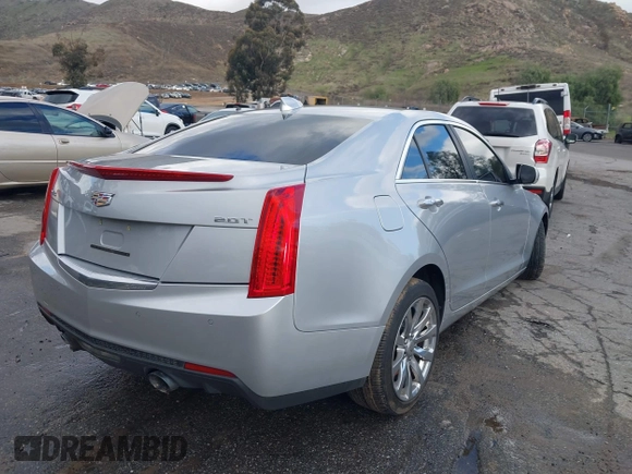 2018 Cadillac ATS Luxury RWD z VIN 1G6AB5RX6J0110860, wystawiony jako IAAI lot #41556662 z przebiegiem 63 886 mil mil oraz . Historia ofert i sprzedaży dostępna na DreamBid. Obrazek 4.