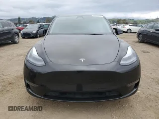 2023 Tesla Model Y Long Range with VIN 7SAYGDEE1PF923998, listed as a Copart auction lot 48954205 with 21,525 mi miles and Salvage Title. Bid and sale history available at DreamBid. Image 5.