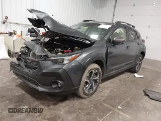 2024 Subaru Crosstrek Premium with VIN JF2GUADC8R8211377, listed as a IAAI auction lot 41953472 with 31,973 mi miles and . Bid and sale history available at DreamBid. Image 2.