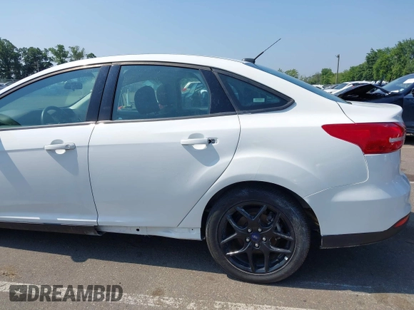 2016 Ford Focus SE with VIN 1FADP3F20GL329898, listed as a IAAI auction lot 42844995 with 20,485 mi miles and . Bid and sale history available at DreamBid. Image 12.