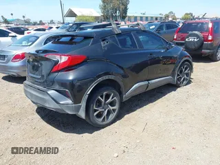 2018 Toyota C-HR XLE z VIN NMTKHMBX3JR024079, wystawiony jako IAAI lot #42110896 z przebiegiem 139 853 mil mil oraz . Historia ofert i sprzedaży dostępna na DreamBid. Obrazek 4.
