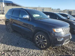 2017 Jeep Grand Cherokee Overland with VIN 1C4RJFCG1HC778818, listed as a Copart auction lot 87368764 with 62,471 mi miles and Salvage Title. Bid and sale history available at carsss.com. Image 4.