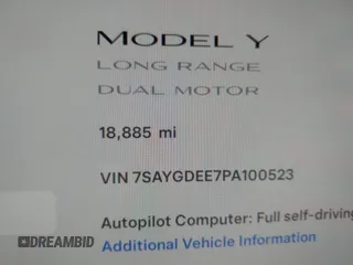 2023 Tesla Model Y Long Range with VIN 7SAYGDEE7PA100523, listed as a IAAI auction lot 40399455 with 18,885 mi miles and . Bid and sale history available at DreamBid. Image 15.
