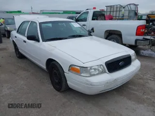 2006 Ford Police Interceptor z VIN 2FAFP71W96X150559, wystawiony jako IAAI lot #41590316 z przebiegiem 127 728 mil mil oraz . Historia ofert i sprzedaży dostępna na DreamBid. Obrazek 1.
