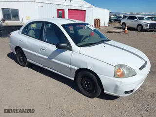 2003 Kia Rio with VIN KNADC125836211761, listed as a IAAI auction lot 41637622 with 117,010 mi miles. Bid and sale history available at carsss.com. Image 1.