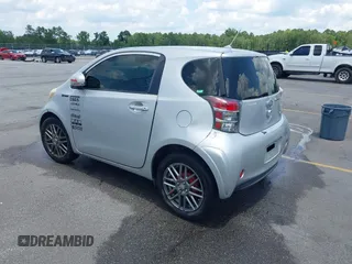 2013 Scion iQ with VIN JTNJJXB00DJ023345, listed as a IAAI auction lot 42631440 with 73,105 mi miles and . Bid and sale history available at DreamBid. Image 3.