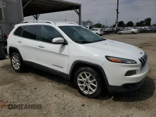 2016 Jeep Cherokee Altitude with VIN 1C4PJLCB4GW216385, listed as a Copart auction lot 57459925 with 154,521 mi miles and Clean title. Bid and sale history available at DreamBid. Image 4.