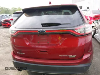 2015 Ford Edge Titanium z VIN 2FMPK3K97FBB70736, wystawiony jako IAAI lot #41998404 z przebiegiem 78 087 mil mil oraz . Historia ofert i sprzedaży dostępna na DreamBid. Obrazek 16.
