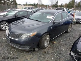 2014 Lincoln MKS EcoBoost with VIN 1LNHL9FT4EG607092, listed as a IAAI auction lot 41483964 with 89,624 mi miles. Bid and sale history available at carsss.com. Image 2.