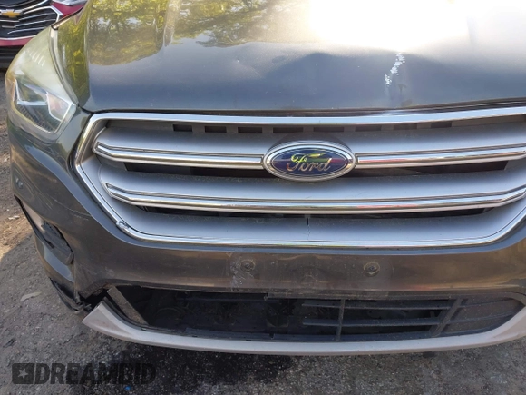 2017 Ford Escape SE z VIN 1FMCU0GDXHUB66813, wystawiony jako IAAI lot #42056150 z przebiegiem 86 915 mil mil oraz . Historia ofert i sprzedaży dostępna na DreamBid. Obrazek 6.