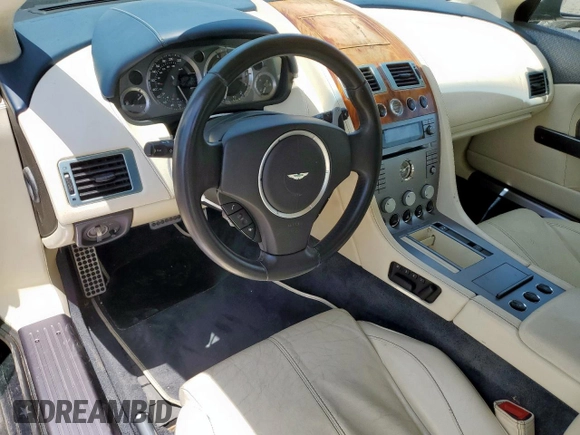 2007 Aston Martin DB9 z VIN SCFAD02A57GB08568, wystawiony jako Copart lot #57238375 z przebiegiem 41 255 mil mil oraz Tytuł czysty. Historia ofert i sprzedaży dostępna na DreamBid. Obrazek 9.