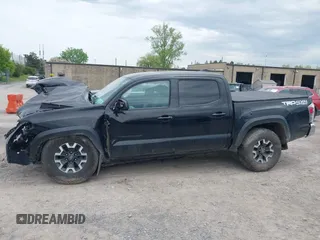 2023 Toyota Tacoma SR with VIN 3TMCZ5AN2PM598464, listed as a IAAI auction lot 42238032 with 35,597 mi miles and . Bid and sale history available at DreamBid. Image 14.