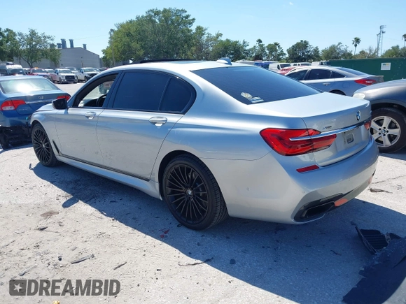 2016 BMW 7 Series 750i xDrive with VIN WBA7F2C52GG417733, listed as a IAAI auction lot 42040625 with 91,007 mi miles. Bid and sale history available at carsss.com. Image 3.