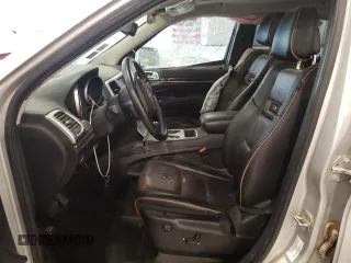 2011 Jeep Grand Cherokee 70th Anniversary with VIN 1J4RR4GG0BC666357, listed as a Copart auction lot 71726674 with 122,802 mi miles and Salvage Title. Bid and sale history available at carsss.com. Image 7.