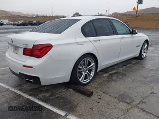 2013 BMW 7 Series 740i with VIN WBAYA6C57DC995338, listed as a IAAI auction lot 41479077 with 123,680 mi miles and . Bid and sale history available at DreamBid. Image 4.
