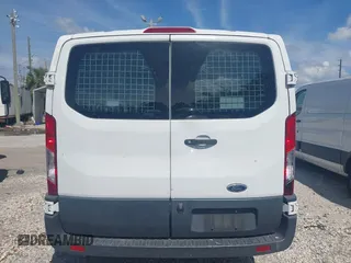 2018 Ford Transit with VIN 1FTYR1YM1JKA89833, listed as a IAAI auction lot 41833114 with 201,883 mi miles and . Bid and sale history available at DreamBid. Image 16.