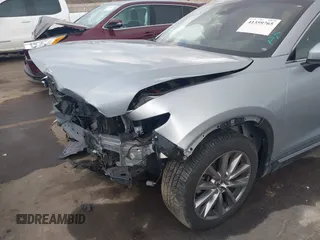 2021 Mazda CX-9 Grand Touring with VIN JM3TCBDY8M0515065, listed as a IAAI auction lot 41359765 with 80,221 mi miles and . Bid and sale history available at carsss.com. Image 6.