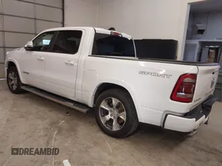 2021 Ram 1500 Laramie with VIN 1C6SRFJT6MN671456, listed as a IAAI auction lot 41087757 with 40,593 mi miles and . Bid and sale history available at DreamBid. Image 3.