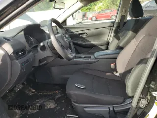 2025 Nissan Sentra S z VIN 3N1AB8BV1SY219311, wystawiony jako Copart lot #56207505 z przebiegiem 11 470 mil mil oraz Szkoda całkowita • Salvage title. Historia ofert i sprzedaży dostępna na DreamBid. Obrazek 7.