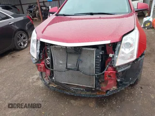 2013 Cadillac SRX Premium Collection with VIN 3GYFNEE3XDS604238, listed as a IAAI auction lot 41949780 with 71,563 mi miles and . Bid and sale history available at DreamBid. Image 6.