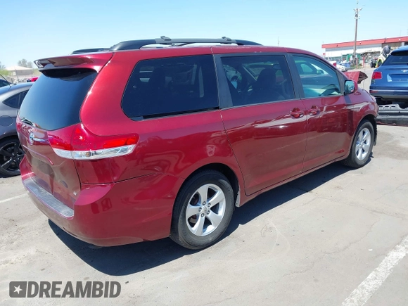 2011 Toyota Sienna LE AAS with VIN 5TDKK3DC2BS118124, listed as a IAAI auction lot 42121524 with 270,284 mi miles. Bid and sale history available at carsss.com. Image 4.