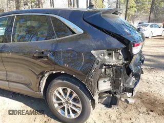 2020 Ford Escape SE z VIN 1FMCU0G6XLUA07056, wystawiony jako IAAI lot #41156940 z przebiegiem 103 707 mil mil oraz . Historia ofert i sprzedaży dostępna na DreamBid. Obrazek 18.