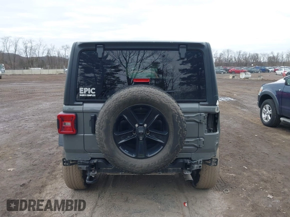 2021 Jeep Wrangler Unlimited Sport Altitude with VIN 1C4HJXDG1MW603784, listed as a IAAI auction lot 41509231 with 102,567 mi miles and . Bid and sale history available at DreamBid. Image 17.