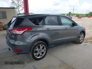 2013 Ford Escape SEL with VIN 1FMCU0HX8DUB61208, listed as a IAAI auction lot 42575283 with 140,330 mi miles and . Bid and sale history available at DreamBid. Image 4.