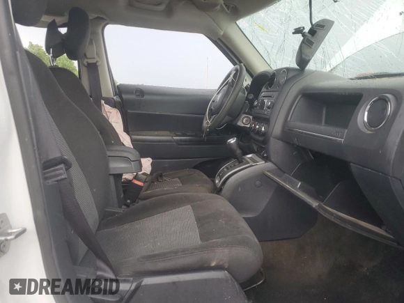 2016 Jeep Patriot Sport with VIN 1C4NJRBB4GD797877, listed as a Copart auction lot 62566055 with 143,306 mi miles and Clean title. Bid and sale history available at DreamBid. Image 7.