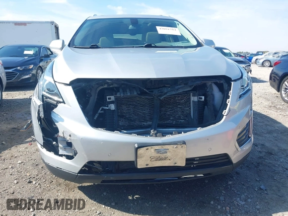 2017 Cadillac XT5 Luxury FWD z VIN 1GYKNBRS3HZ223077, wystawiony jako IAAI lot #42091584 z przebiegiem 154 664 mil mil oraz . Historia ofert i sprzedaży dostępna na DreamBid. Obrazek 6.