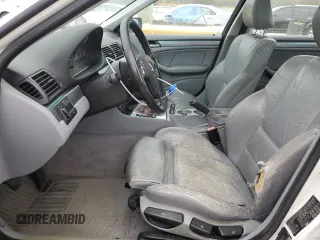 1999 BMW 3 Series 323i with VIN WBAAM3333XKC59029, listed as a Copart auction lot 76257774 with 301,189 mi miles and Salvage Title. Bid and sale history available at carsss.com. Image 7.